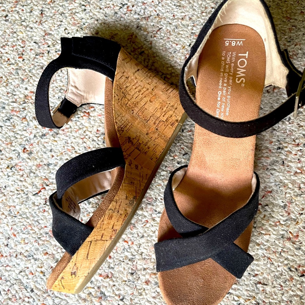 Toms 8.5 black canvas wedge heel.
